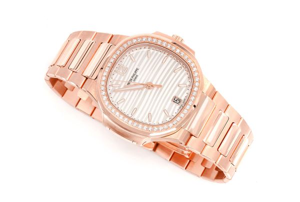 Patek Philippe Nautilus 18k Rose Gold Ladies Factory Diamond Bezel 32MM (model/mm)